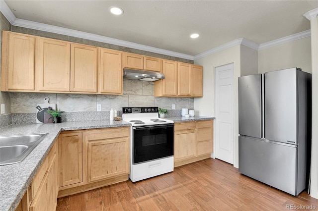 21455 E 44th Ave, Denver, CO 80249 - kitchen featuring freestanding refrigerator, under cabinet range hood, electric stove, and light brown cabinets