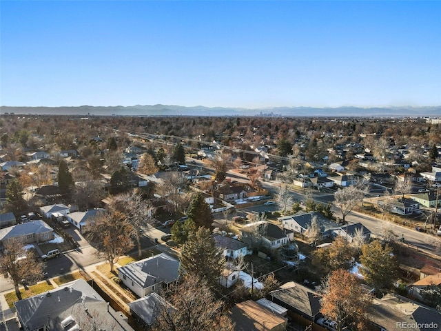 birds eye view of property with a mountain view