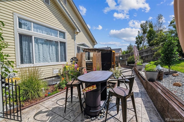 4293 Clover Ln, Brighton, CO 80601 - view of patio with fence and outdoor dining space