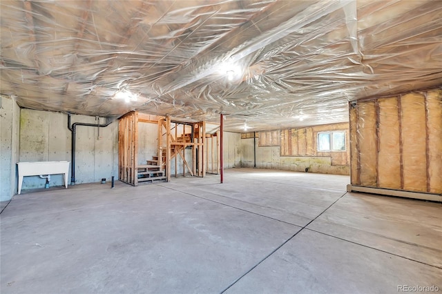 basement with a baseboard heating unit