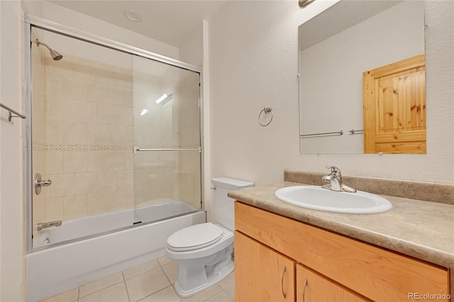 54 Doe Trl, Nederland, CO 80466 - full bathroom with tile patterned flooring, toilet, vanity, and shower / bath combination with glass door