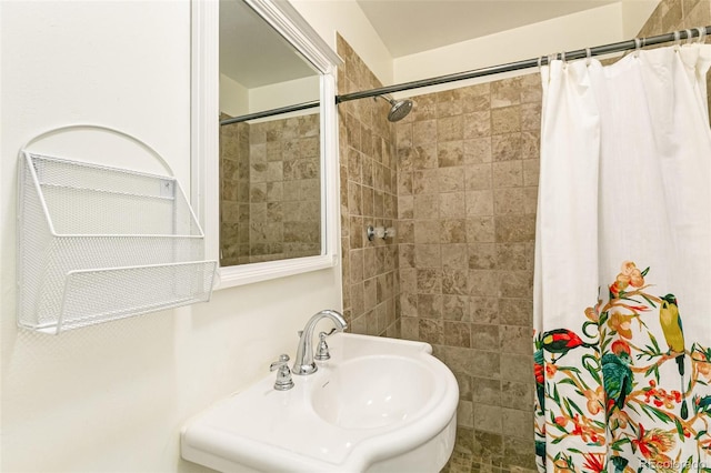 bathroom with sink and walk in shower