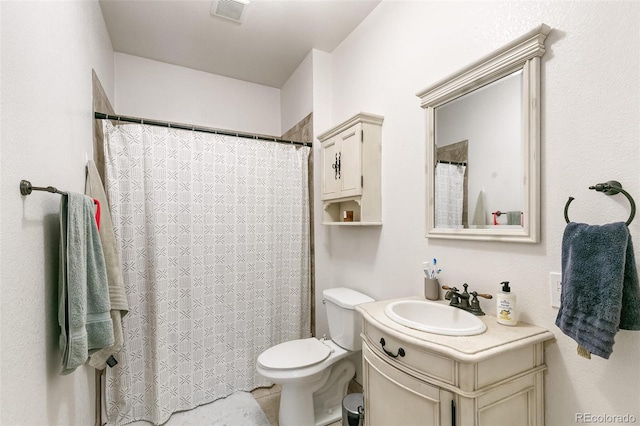 bathroom with vanity, toilet, tile patterned flooring, and a shower with shower curtain