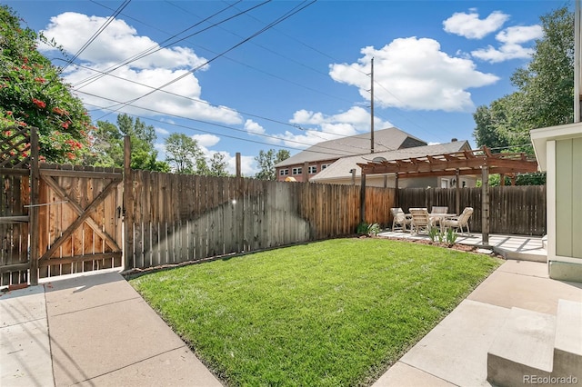 view of yard featuring a pergola and a patio area