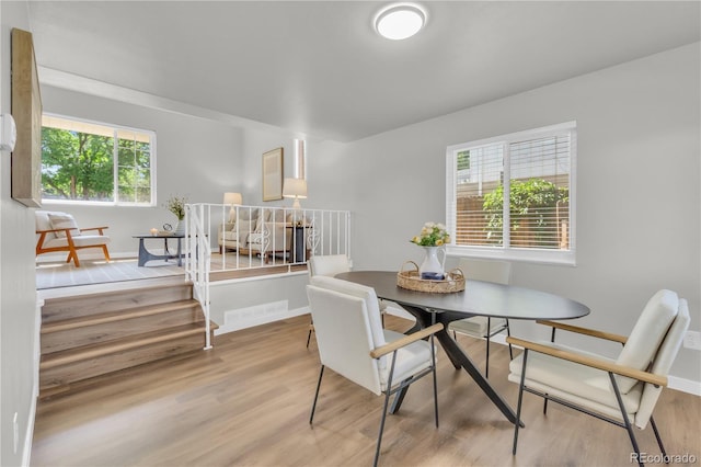 7055 S Costilla St, Littleton, CO 80120 - dining space with wood finished floors and baseboards
