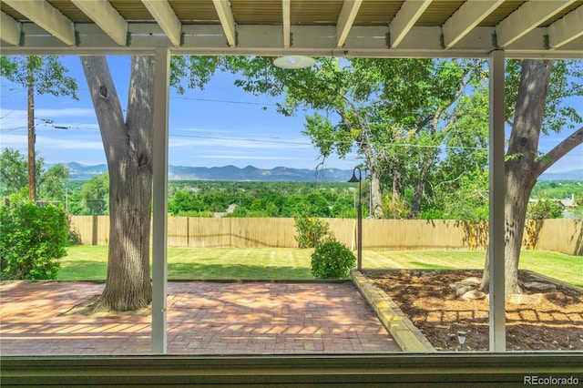 7055 S Costilla St, Littleton, CO 80120 - fenced backyard featuring a deck with mountain view