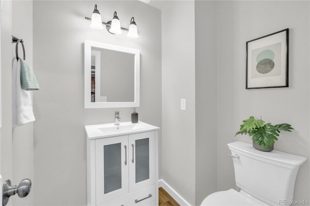 7055 S Costilla St, Littleton, CO 80120 - bathroom with toilet and vanity