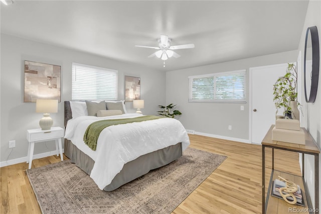 7055 S Costilla St, Littleton, CO 80120 - bedroom featuring wood finished floors and a ceiling fan