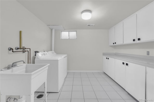 7055 S Costilla St, Littleton, CO 80120 - laundry room featuring cabinet space and separate washer and dryer