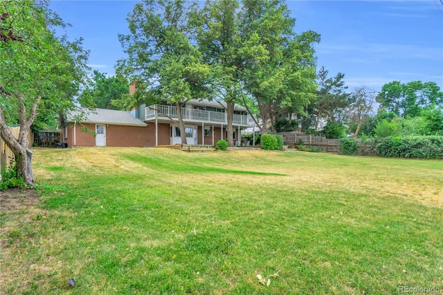 7055 S Costilla St, Littleton, CO 80120 - view of yard with a balcony