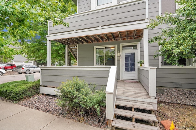 entrance to property with covered porch