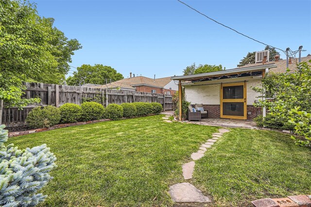 1292 Kearney St, Denver, CO 80220 - view of yard with a patio and an outdoor hangout area