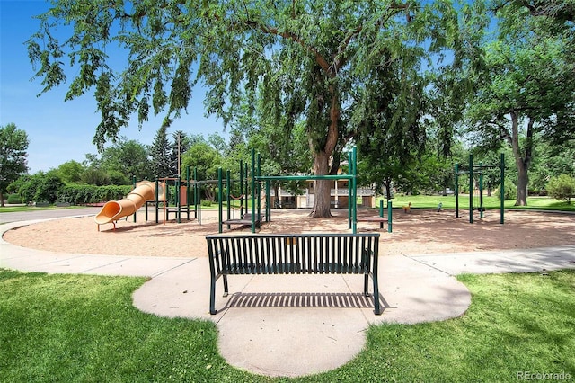 1292 Kearney St, Denver, CO 80220 - community play area featuring a lawn and view of wooded area