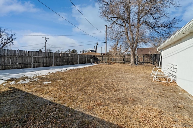 view of yard featuring a fenced backyard