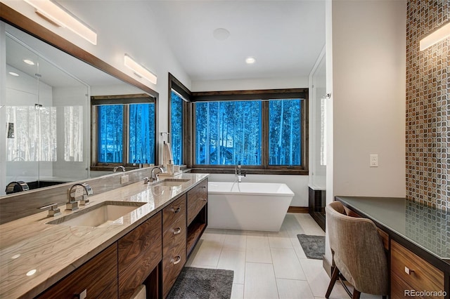 141 Sawmill Run Dr, Breckenridge, CO 80424 - bathroom with a soaking tub, double vanity, tile patterned floors, and a shower
