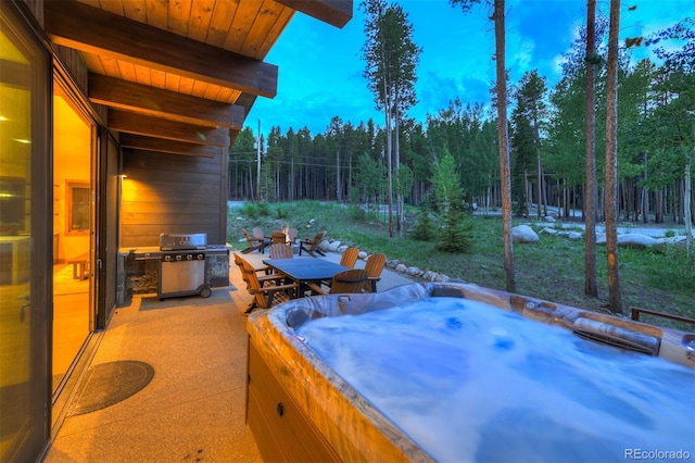 141 Sawmill Run Dr, Breckenridge, CO 80424 - view of patio with a hot tub, a grill, and outdoor dining space