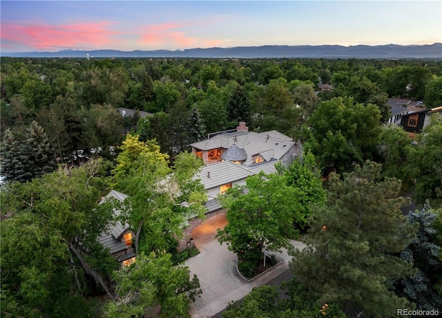 850 E Radcliff Ave, Cherry Hills Village, CO 80113 - view of subject property featuring a heavily wooded area and a mountainous background