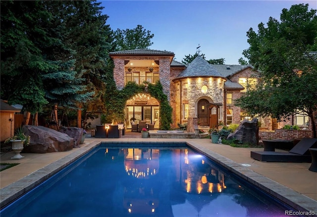 850 E Radcliff Ave, Cherry Hills Village, CO 80113 - outdoor pool with a patio and an outdoor living space