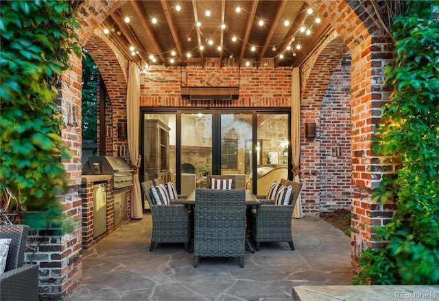 850 E Radcliff Ave, Cherry Hills Village, CO 80113 - view of patio / terrace featuring an outdoor kitchen and outdoor dining space