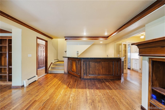 850 E Radcliff Ave, Cherry Hills Village, CO 80113 - indoor dry bar with a baseboard radiator, light wood finished floors, ornamental molding, stairs, and recessed lighting