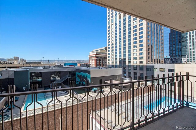 balcony featuring a city view