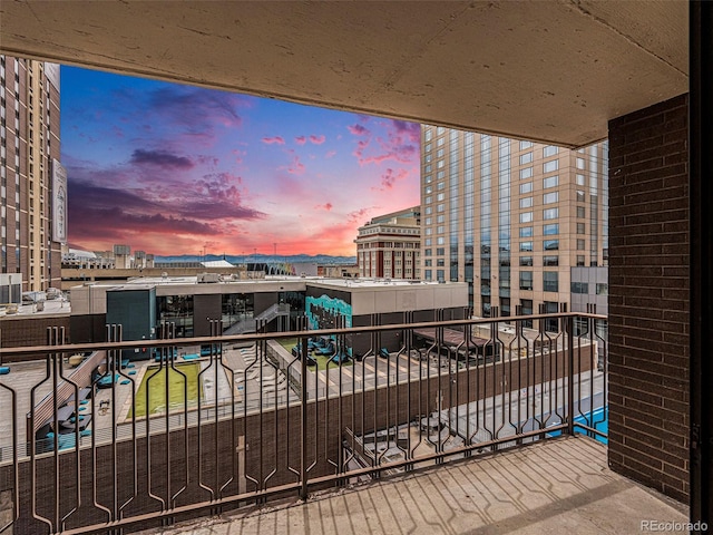 1020 15th St Unit 7A, Denver, CO 80202 - balcony at dusk featuring a view of city