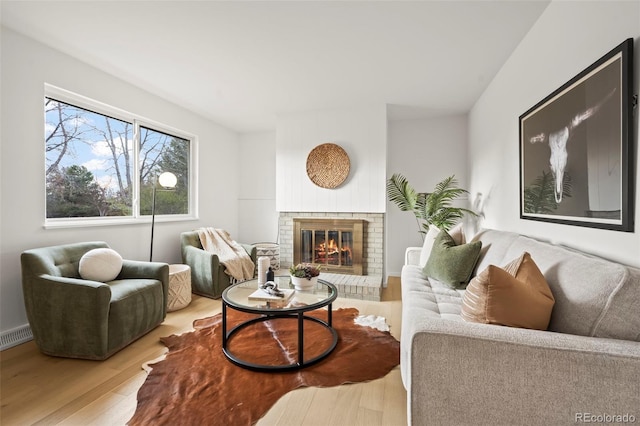 3545 Cloverleaf Dr, Boulder, CO 80304 - living area featuring wood finished floors and a fireplace