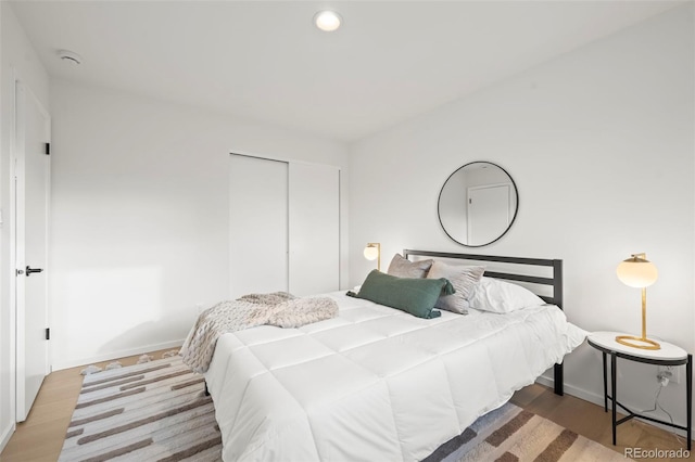 3545 Cloverleaf Dr, Boulder, CO 80304 - bedroom featuring wood finished floors and recessed lighting