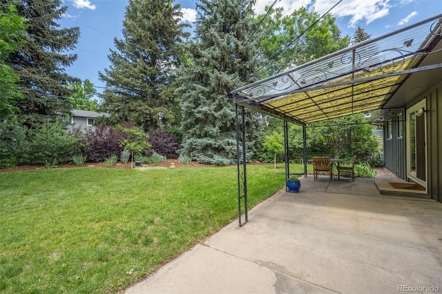 3545 Cloverleaf Dr, Boulder, CO 80304 - view of grassy yard with a patio