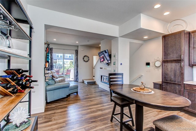 8361 Parkland St, Broomfield, CO 80021 - dining space with baseboards, wood finished floors, and recessed lighting
