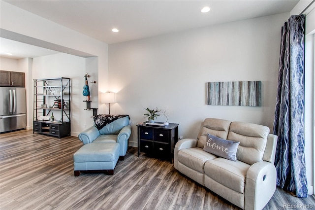 8361 Parkland St, Broomfield, CO 80021 - living room featuring baseboards, wood finished floors, and recessed lighting