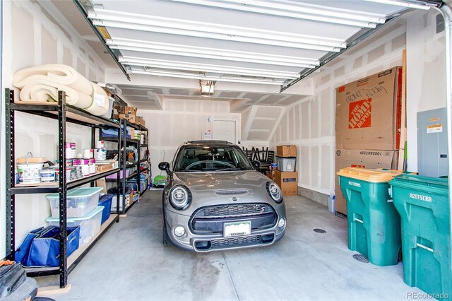 8361 Parkland St, Broomfield, CO 80021 - garage featuring a garage door opener