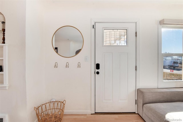 entryway with light hardwood / wood-style floors