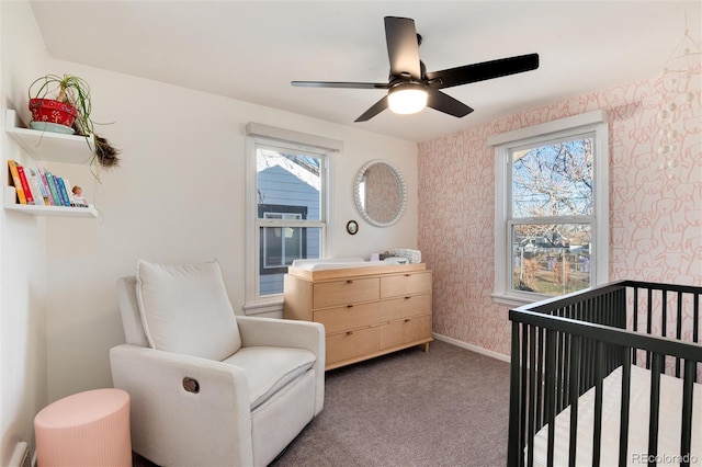 4920 Clay St, Denver, CO 80221 - bedroom with a crib, multiple windows, carpet flooring, and wallpapered walls