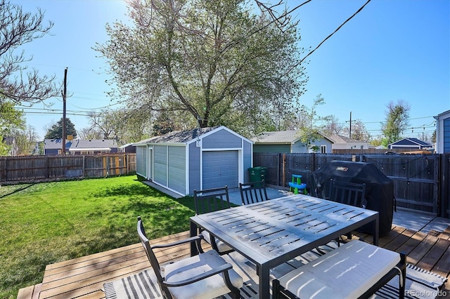 4920 Clay St, Denver, CO 80221 - wooden deck with outdoor dining area, a fenced backyard, a yard, a storage shed, and an outbuilding