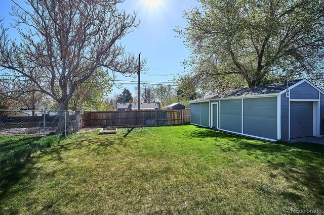 4920 Clay St, Denver, CO 80221 - view of yard featuring a fenced backyard and an outbuilding