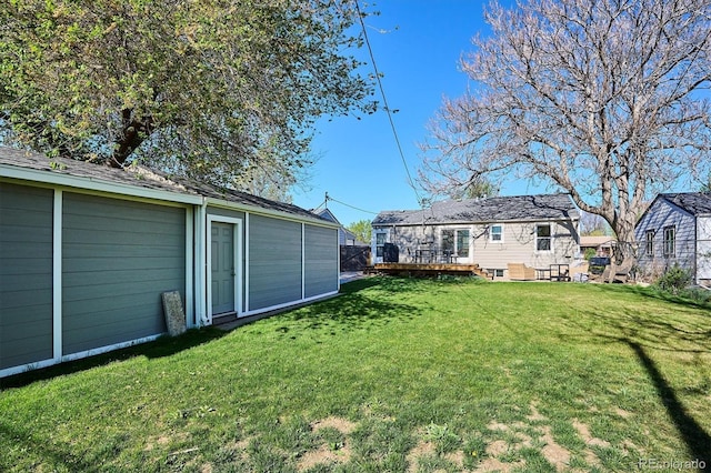 4920 Clay St, Denver, CO 80221 - view of yard featuring a deck and an outdoor structure