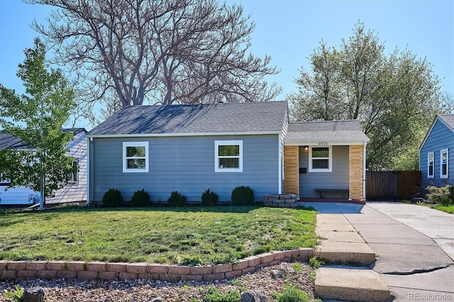 4920 Clay St, Denver, CO 80221 - view of front of house with fence and a front yard