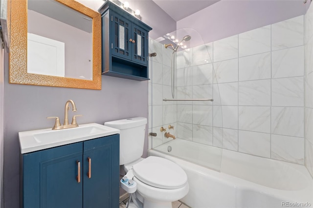 bathroom featuring vanity, toilet, and bathing tub / shower combination