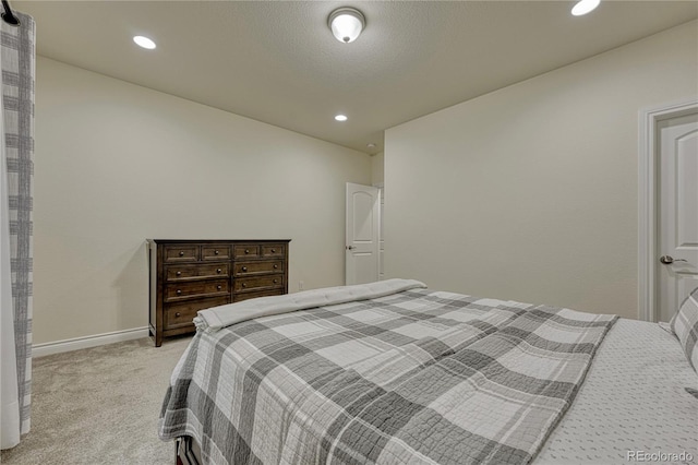 13190 Stone Peaks Way, Peyton, CO 80831 - bedroom with light carpet and recessed lighting