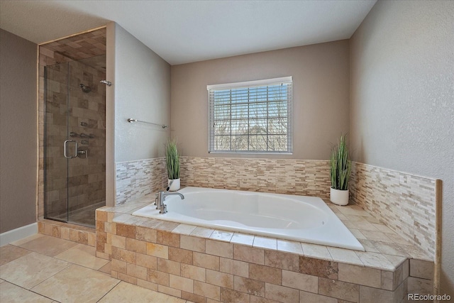 bathroom featuring separate shower and tub and tile patterned floors