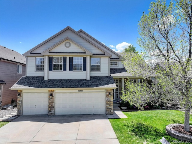 22388 Quail Run Dr, Parker, CO 80138 - view of front of home featuring an attached garage, roof with shingles, concrete driveway, stone siding, and a front yard