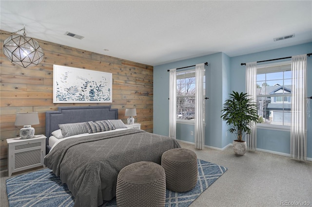 22388 Quail Run Dr, Parker, CO 80138 - bedroom with wooden walls, baseboards, and carpet