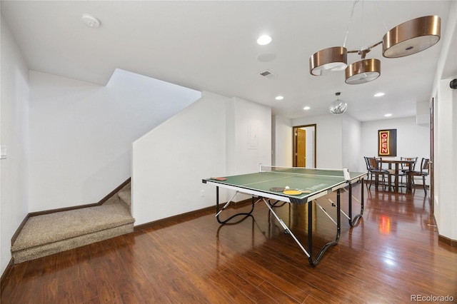 playroom featuring baseboards, wood finished floors, visible vents, and recessed lighting