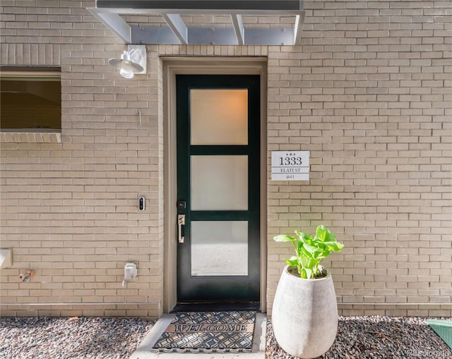 1333 Elati St Unit 1, Denver, CO 80204 - property entrance featuring brick siding