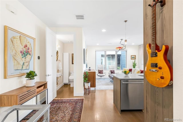 1333 Elati St Unit 1, Denver, CO 80204 - hall with recessed lighting, visible vents, and light wood finished floors
