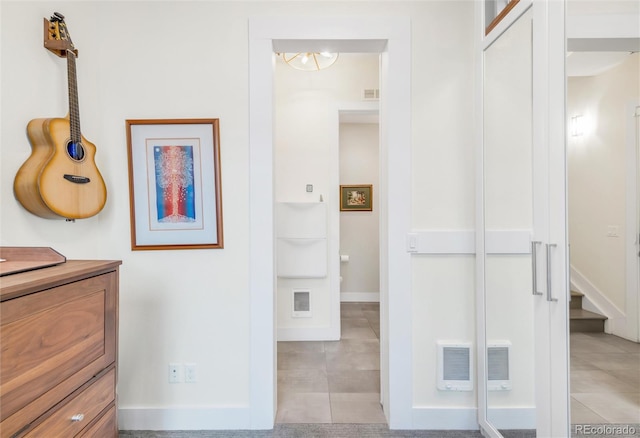 1333 Elati St Unit 1, Denver, CO 80204 - interior space featuring visible vents, an inviting chandelier, tile patterned flooring, and vanity
