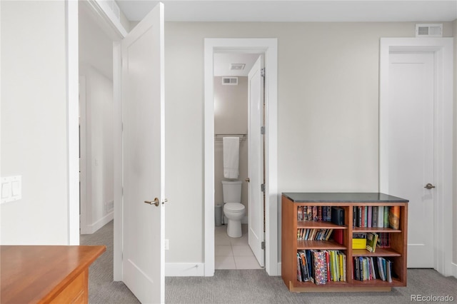 1333 Elati St Unit 1, Denver, CO 80204 - bathroom featuring visible vents, baseboards, tile patterned flooring, and toilet