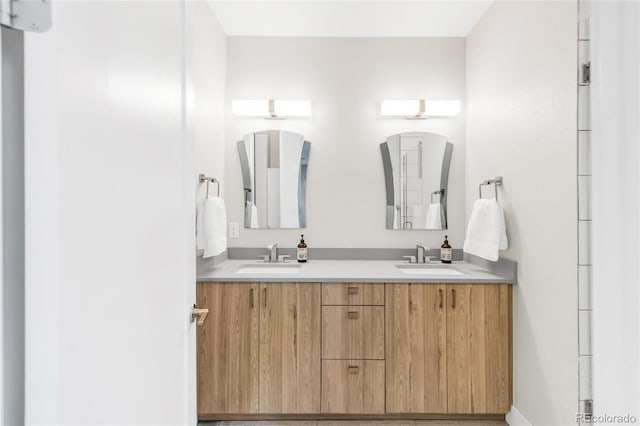 1333 Elati St Unit 1, Denver, CO 80204 - bathroom featuring double vanity and a sink