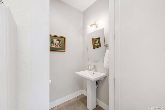 1333 Elati St Unit 1, Denver, CO 80204 - half bathroom featuring baseboards